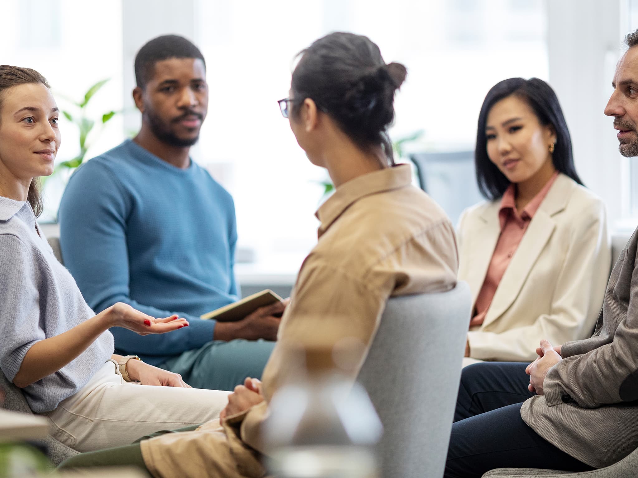 Therapy group working together toward growth